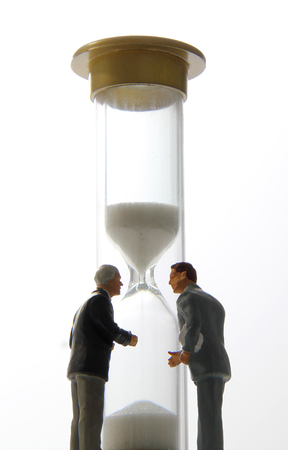 Two business men discussing a business deadline.