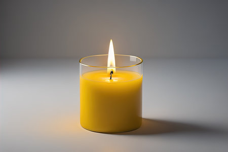Creative burning candle on a wooden background. ai generativeの素材