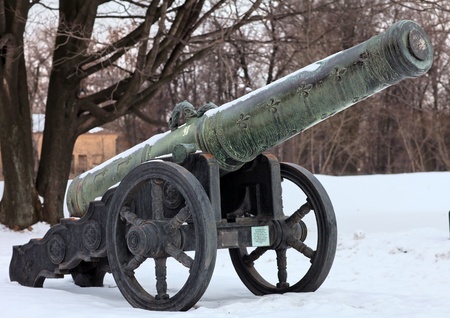 The old medieval bronze cannon on the gun carriageの写真素材