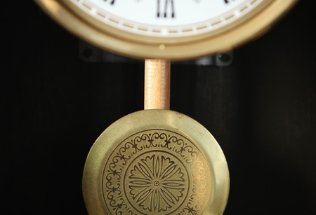 clock with pendulumの写真素材