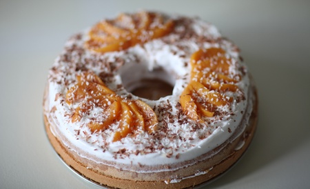 sponge cake with apricot cream and grated chocolateの写真素材