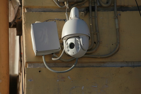 outdoor surveillance video camera in the wall