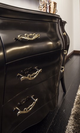 Chest of drawers ebony with gold handles