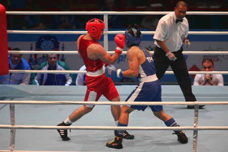 boxing uppercut right hand
St. Petersburg, Russia, November 21, 2016 AIBA Youth World Boxing Championships  men heavy 81 kg. Boxing match between: RED-  Rustamov  S., Uzbekistan  BLUE -Kan  C., Taipei,のeditorial素材
