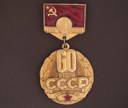Soviet medal with the inscription 60 years of the USSR on a brown backgroundのeditorial素材