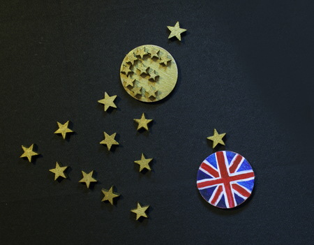 Christmas tree with euro coin and British coin, Brexit disintegrationconcept の写真素材