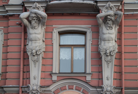 St. Petersburg, Russia, 5 March 2018,  sculptural figures of the Atlanteans, architectural decorations of facade buildingのeditorial素材