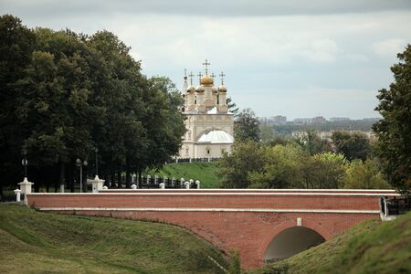 Ryazan Russia September 10, 2013 christian church on high river bank,stone bridge red brickの写真素材