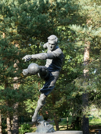 St. Petersburg, Russia, August 27, 2019 Monument to the football player Vsevolod Bobrov, soccer player kick  ball in motionのeditorial素材