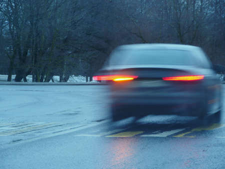 car blurred motion, red traffic lights