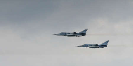 Su-24 Russian bomber with variable sweep wing in flight