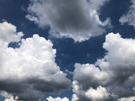 rain cumulus clouds, cloudy white gray blue landscapeの写真素材