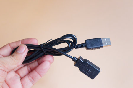 A male to female USB cable, a symbol of connectivity and extension in the digital age.の写真素材