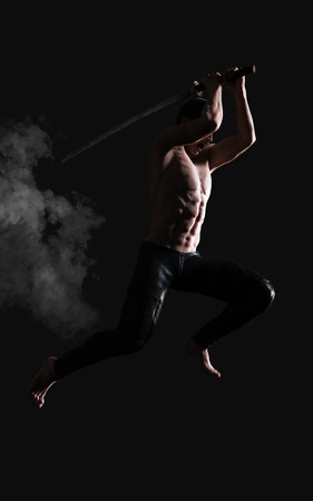 3d Illustration Human Portrait Of A Handsome Muscular Ancient Warrior With A Sword Included Clipping Pathの写真素材