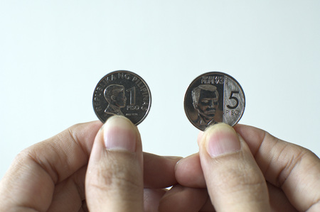 A newly issued five peso coins of Banko Sentral ng Pilipinasの写真素材