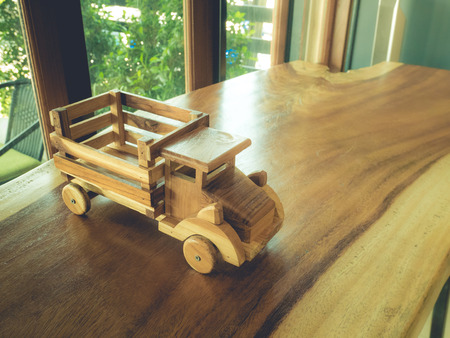 Wooden truck on the tableの写真素材