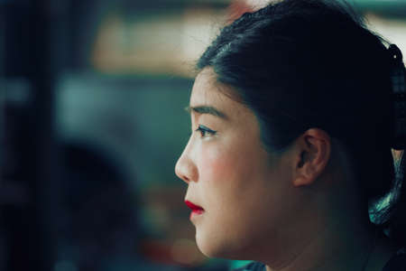 Portrait of head asia woman with side face and copy space for text.の写真素材