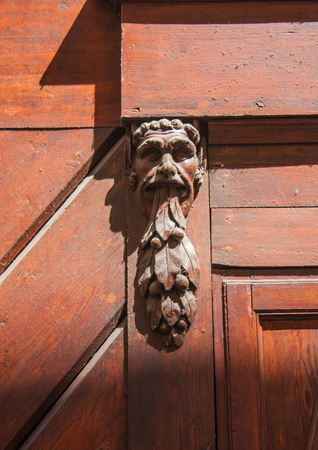 Doorknocker on the front door of the Italian buildingのeditorial素材