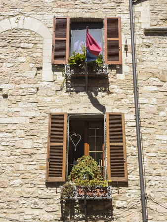 Wooden shutter on a historic house in an Italian cityの写真素材