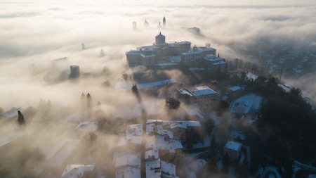 Bergamo, Italy. Aerial view from the plains and the old townの写真素材