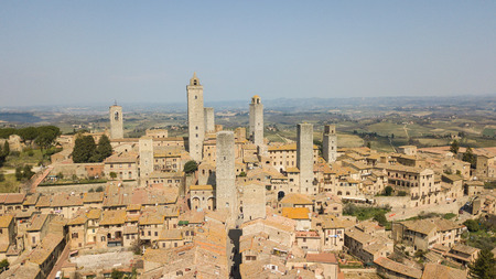 aerial landscape of the wonderful village of San Gimignano Tuscany, Italyの写真素材