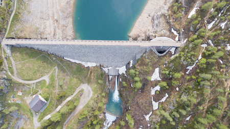 Aerial drone view of the Lake Fregabolgia and the dam, on an alpine artificial lake. Italian Alps. italyの写真素材