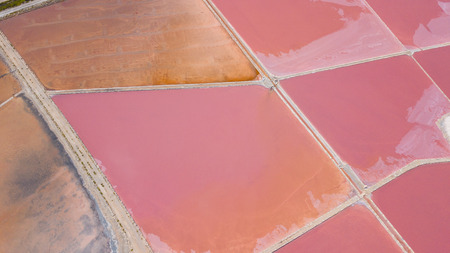 Earth's line. A drone vertical perspective of the ground's colors and shapes. Salt flats at Colonia de Sant Jordi, Ses Salines, Mallorca, Spainの写真素材