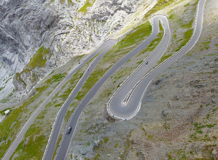 Road to the Stelvio mountain pass in Italy. Amazing aerial view of the mountain