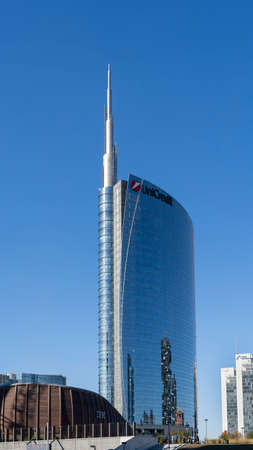 Milan, Italy. The iconic Unicredit tower at Gae Aulenti square. Skyscraper which is part of a group of residential and business buildings. Architectural modern buildingsのeditorial素材