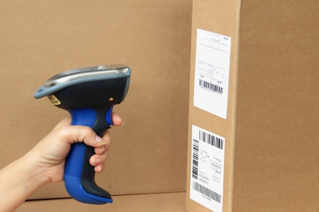 Bluetooth Barcode and QR Code Scanner, showing scan barcode lebel on the box の写真素材