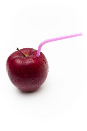 Red Apple with Straw, Isolated on White の写真素材