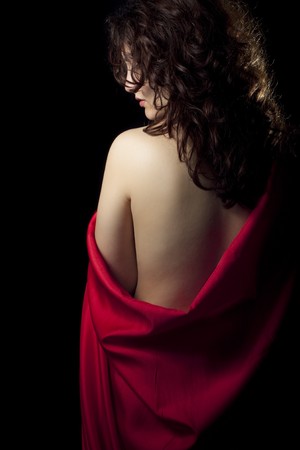 Naked Girl with Red Satinの写真素材