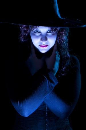 Pretty Witch in Blue Lightの写真素材