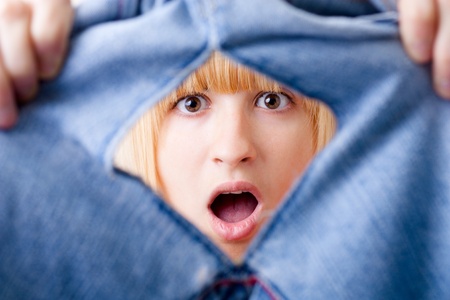 Shocked Woman with Torn Jeansの写真素材