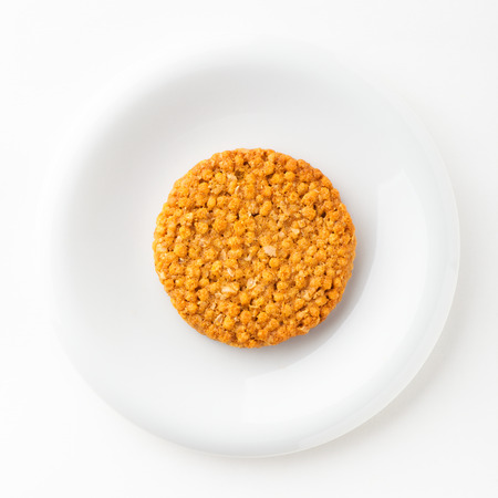 One Grain Cookie on White Round Dishの写真素材