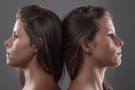Two Serious Twin Sisters' Profileの写真素材