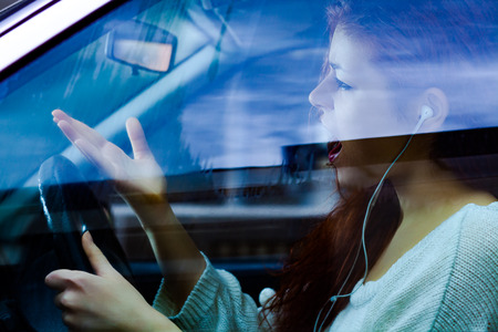 Angry Woman Shouting While Driving a Car