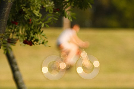 People and cyclist in the street, urban, abstract blurryの写真素材