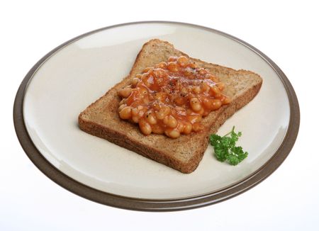 A simple snack of Beans on Toast isolated.の写真素材