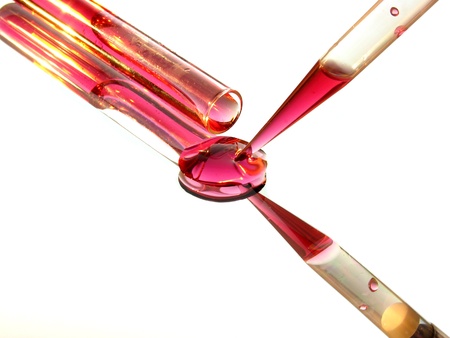 Test tube with red liquid and piepetteの写真素材