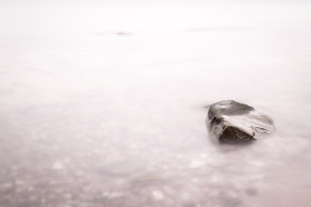 Stone details in the waterの写真素材