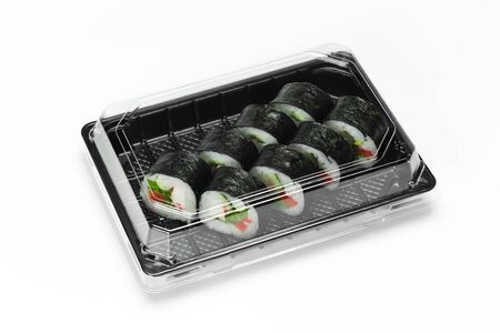 Traditional Sushi roll with salmon, nori and vegetables in a plastic container box for take awayの写真素材