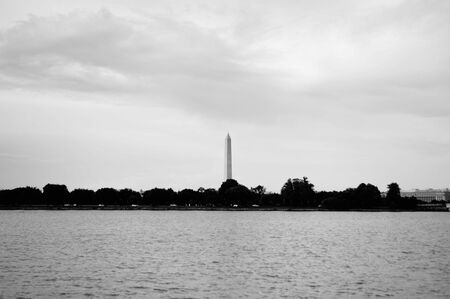 Washington, DC, USA. 08 18 2018. Washington Monument, obelisk in National Mall. View from river. Black and white.のeditorial素材