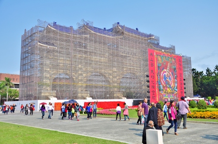 TAIPEI, TAIWAN - MARCH 8, 2015: The Gate of Integrity, front gate of Chiang Kai-Shek Memorial Hall is under renovation in Taipei, Taiwan. Chiang Kai-shek Memorial Hall is a landmark of Taiwan.のeditorial素材