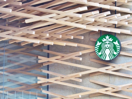 FUKUOKA, JAPAN - JULY 16, 2016: Starbucks coffee shop beside road to Dazaifu Tenmangu, a popular...