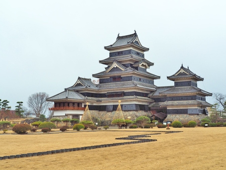 Matsumoto Castle is a Japanese castle in rainy day at Matsumoto, Nagano, Japan. The building is also known as the Crow Castle due to its black exterior, It is listed as a National Treasure of Japan.のeditorial素材