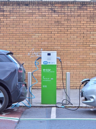 Dublin, Ireland - June 3, 2017: Electric Vehicle 'EV' charging electric power in battery at public charge point. Ecars operates and maintains 1,200 public charge points across the island of Ireland.のeditorial素材