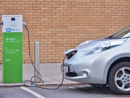 Dublin, Ireland - June 3, 2017: Electric Vehicle 'EV' charging electric power in battery at public charge point. Ecars operates and maintains 1,200 public charge points across the island of Ireland.のeditorial素材