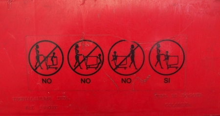 instructions how to carry and carry a small child in a supermarket basketの写真素材