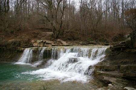 Waterfall on mountain river の写真素材